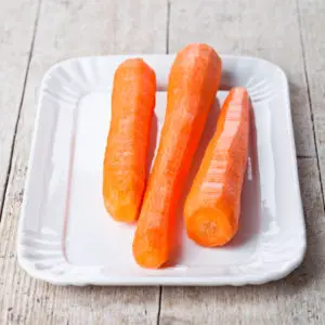 fresh carrots on a plate -Can Shih Tzus Eat Carrots