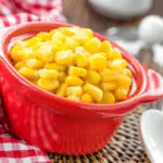 corn in a red bowl on a table - can shih tzus eat corn