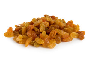 Raisins isolated on a white background -Can Shih Tzus Eat Grapes